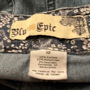 Ladies, blue epic denim skirt, size 12, decorative buttons down the front